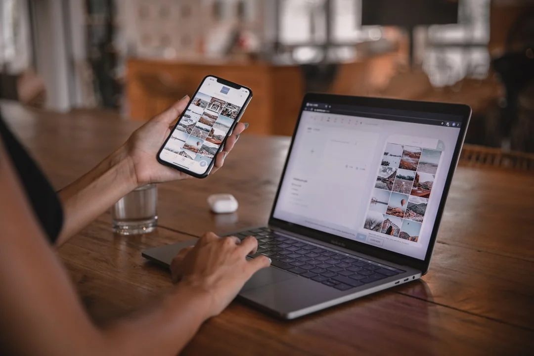 A person reviews statistical graphs on a tablet, showcasing data analysis and technology.